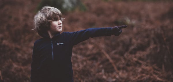 take personal responsibility - boy pointing away at something else