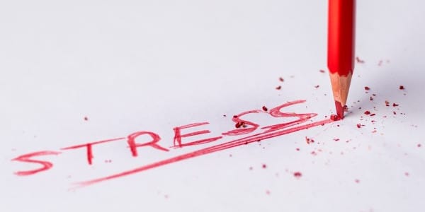 benefits of time management - stress written in red pencil
