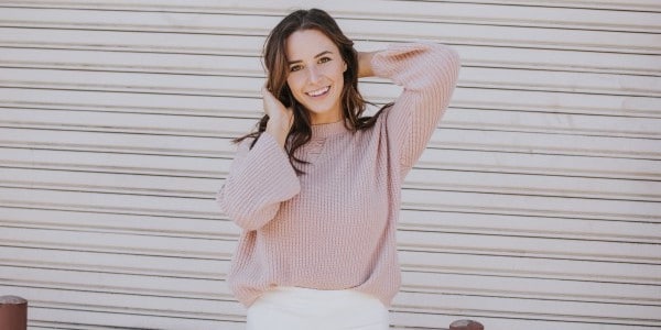 benefits of time management -woman posing, smiling