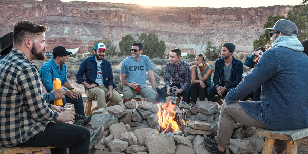 best year ever - group of people by campfire