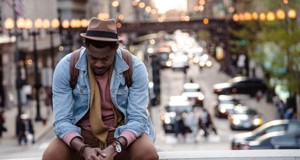 why fail to achieve goals - man sitting, sad