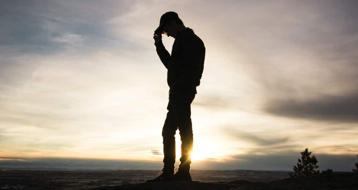 steps-fail-goals- silhouette of man holding cap