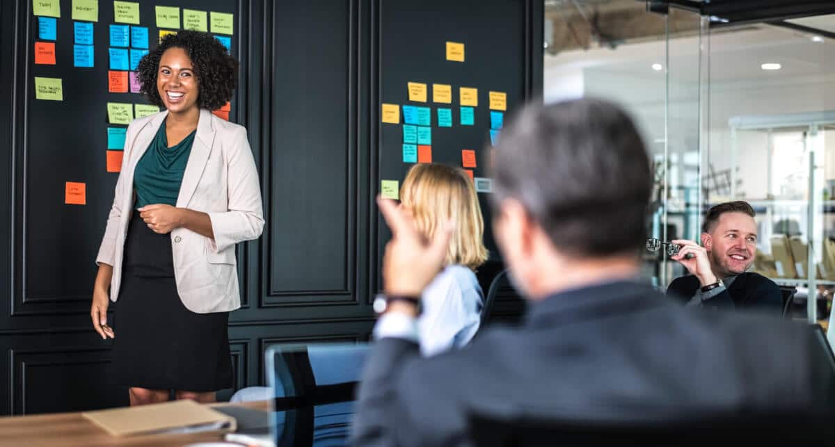 setting business goals - woman leading meeting