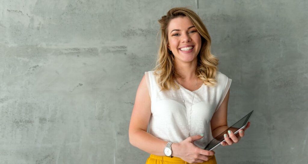 woman standing smiling